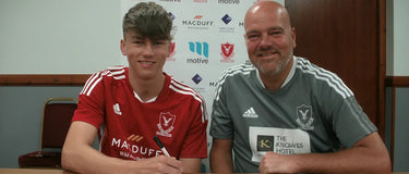 Jack Mitchell Signs First Senior Contract